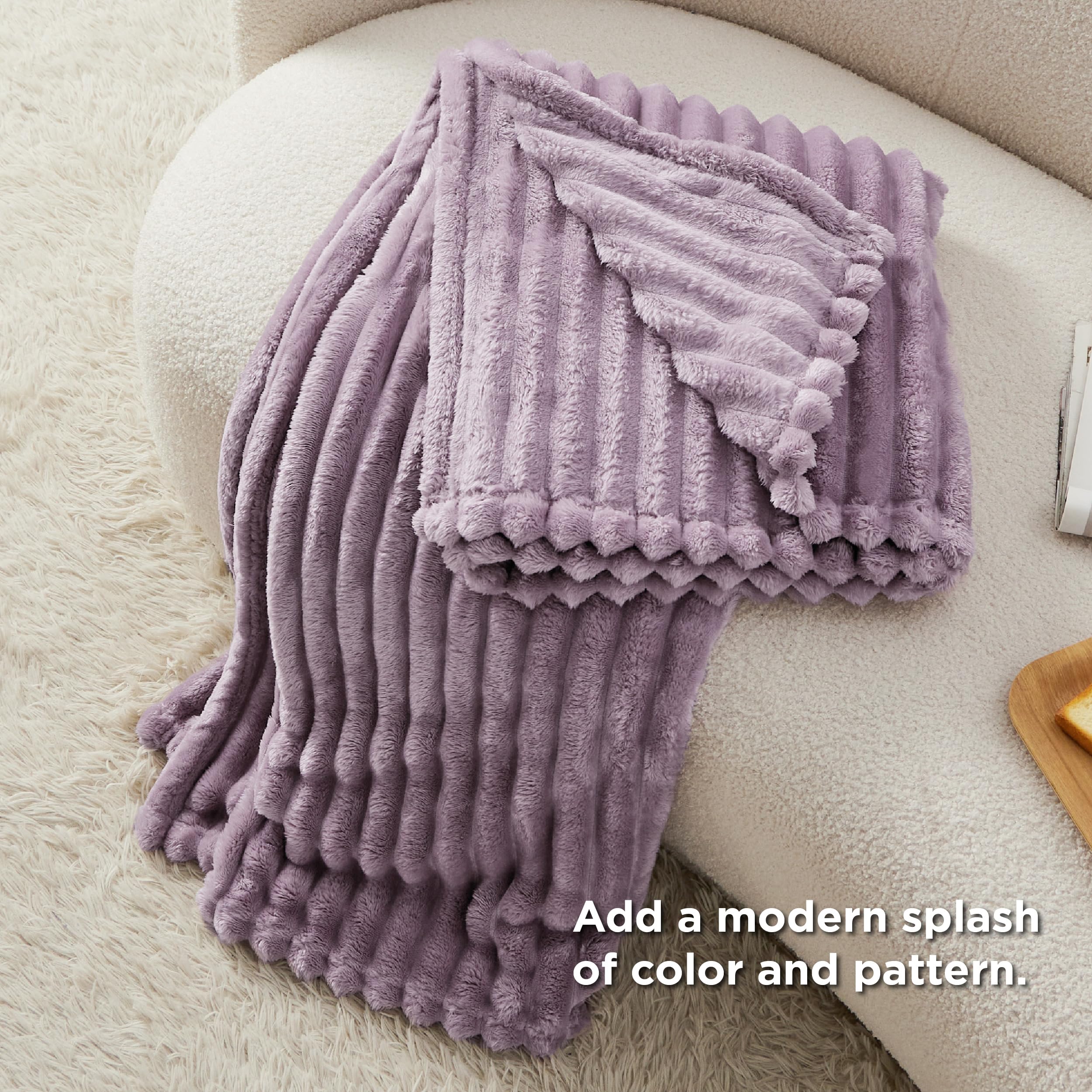 Bedsure GentleSoft light purple throw color stays vibrant after washes.