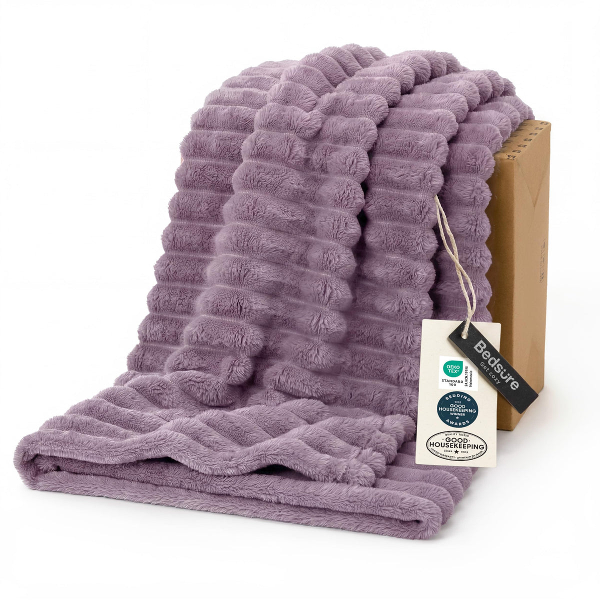Bedsure GentleSoft light purple throw on couch adds cozy warmth.