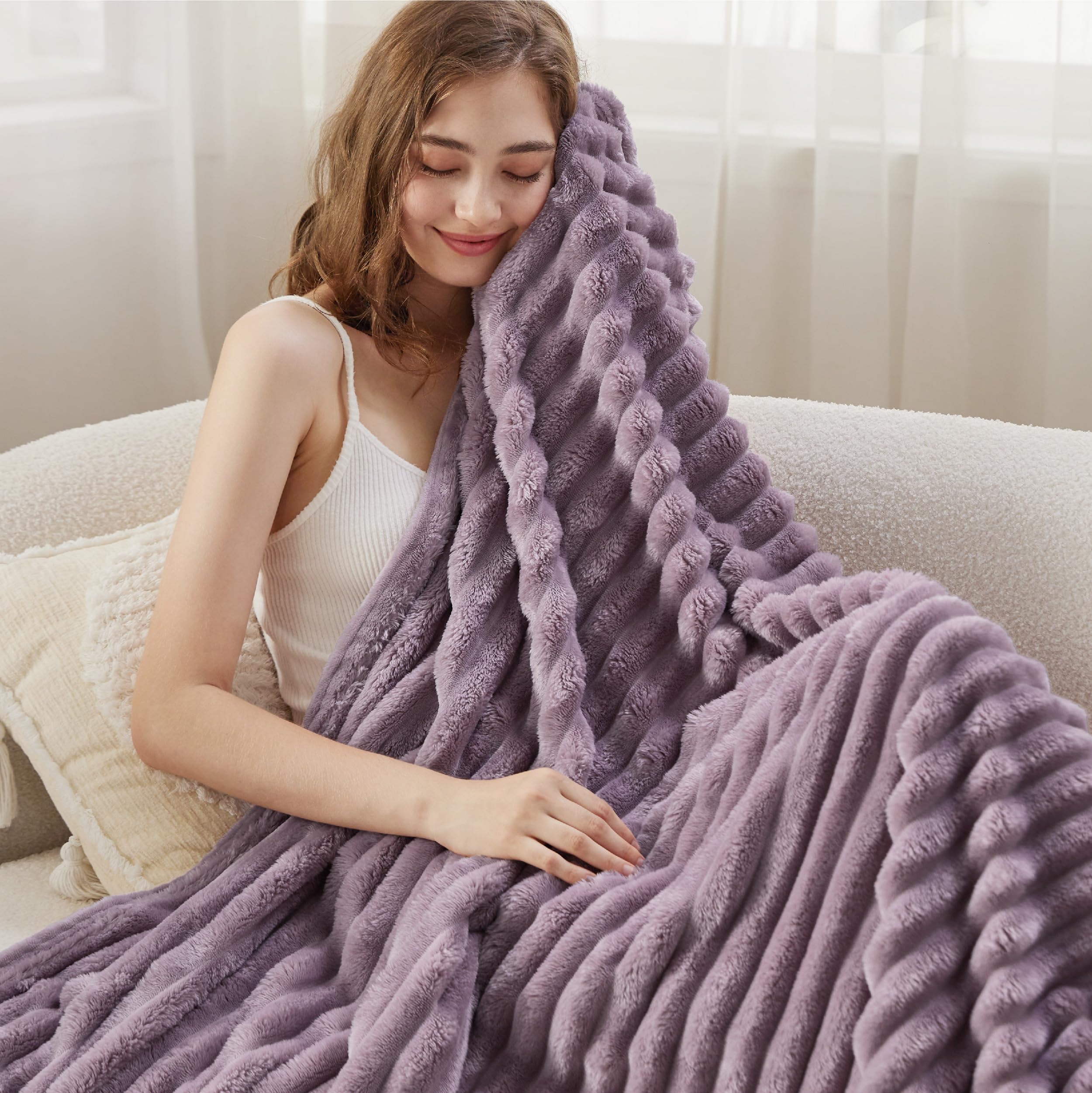 Bedsure GentleSoft purple throw adds modern decor and soft texture.