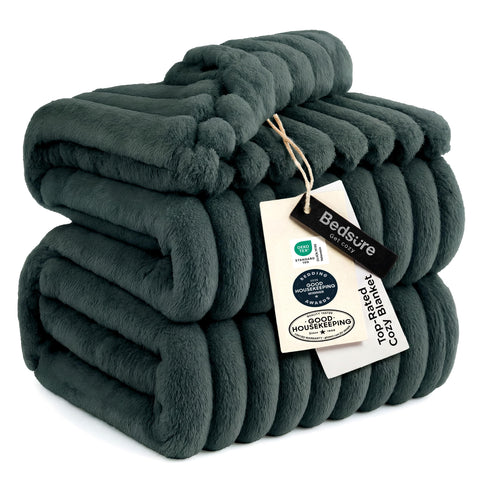 Bedsure GentleSoft Mallard Green fleece blanket on couch for cozy lounging.