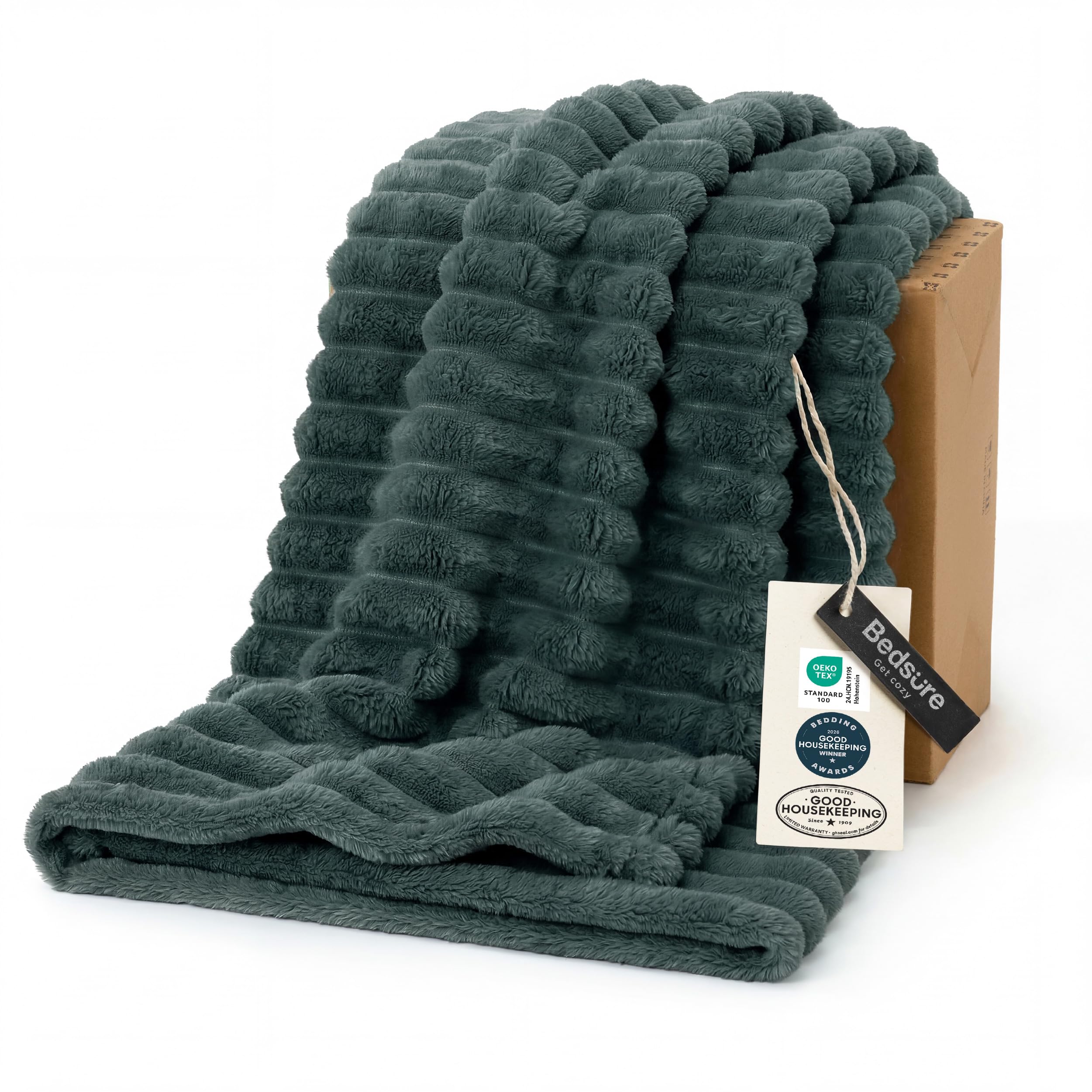 Bedsure GentleSoft Mallard Green fleece blanket on couch with striped texture for cozy evenings