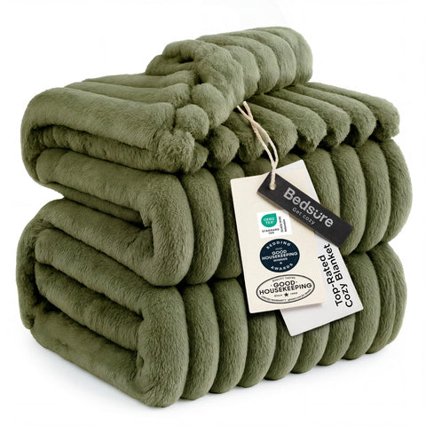 Bedsure GentleSoft moss fleece blanket on couch for cozy lounging.
