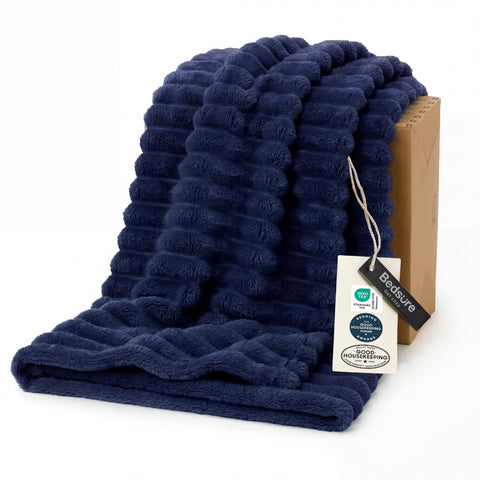 Bedsure GentleSoft navy blanket closeup texture for cozy lounging.