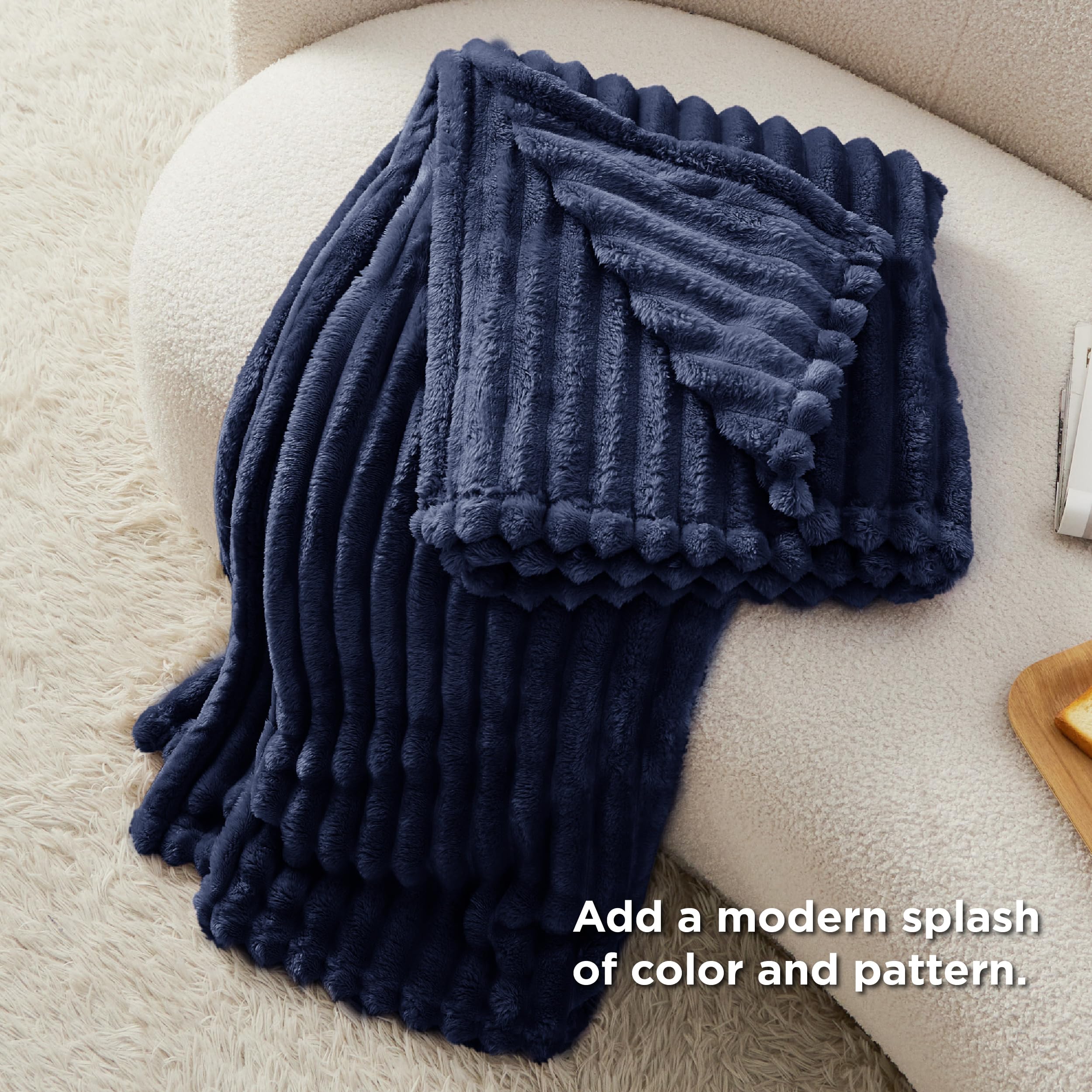 Bedsure GentleSoft navy blanket dye detail highlights rich color depth.