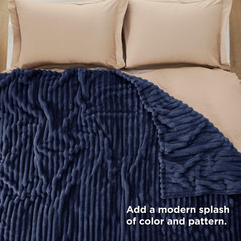 Bedsure GentleSoft navy blanket with durable stitching for long lasting use