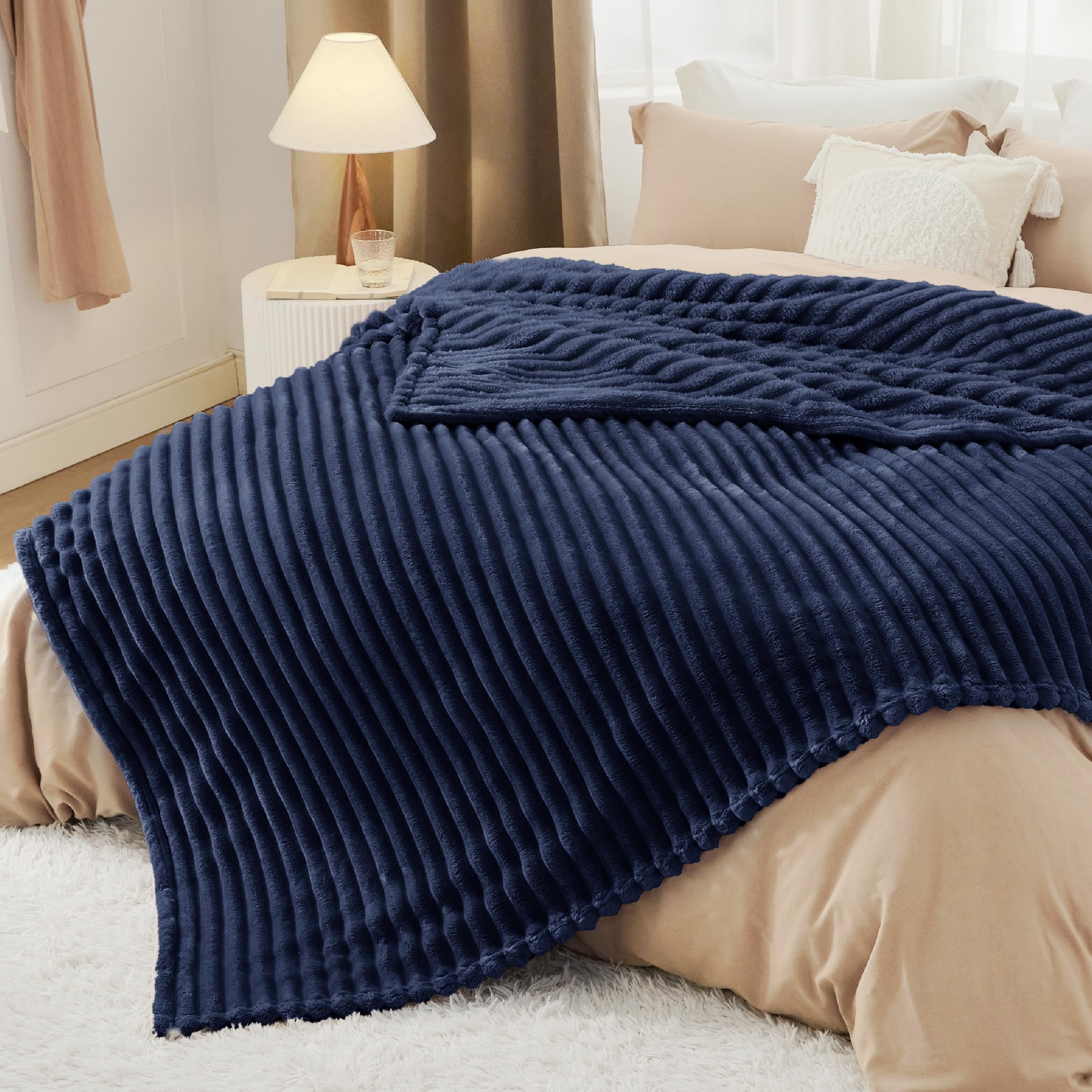 Bedsure GentleSoft navy blanket is machine washable for easy care