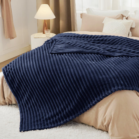Bedsure GentleSoft navy blanket is machine washable for easy care