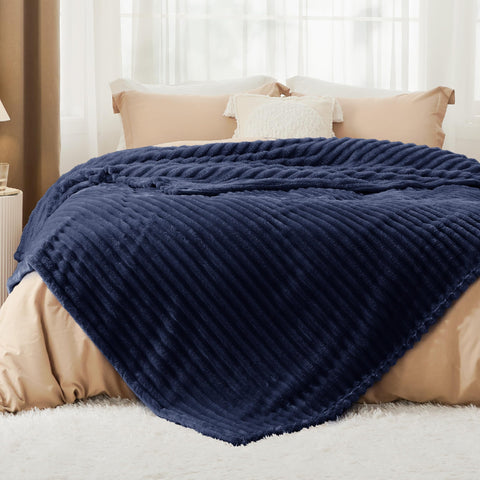 Bedsure GentleSoft navy microfiber blanket delivers ultra-soft warmth for movie nights