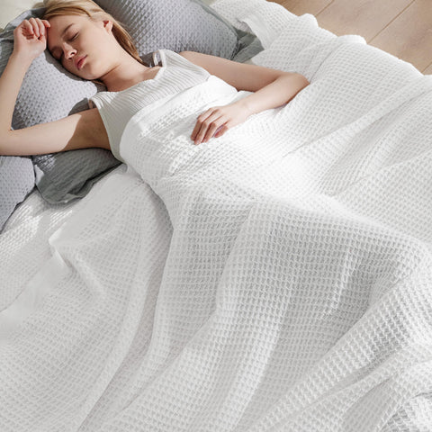 Oversized Bedsure Gentlesoft blanket 120x94 on a sofa for warmth