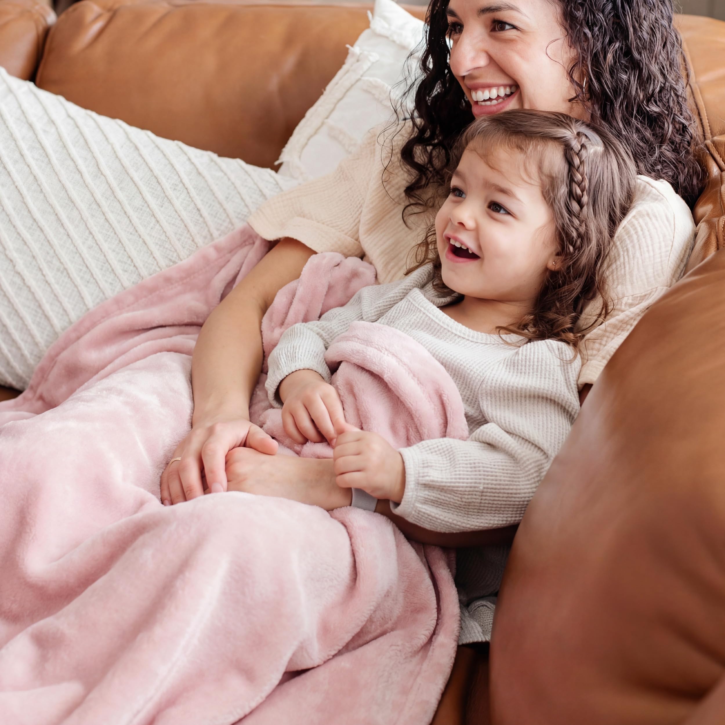 Bedsure GentleSoft pink fleece blanket in natural light emphasizes softness