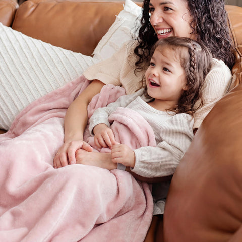 Bedsure GentleSoft pink fleece blanket in natural light emphasizes softness