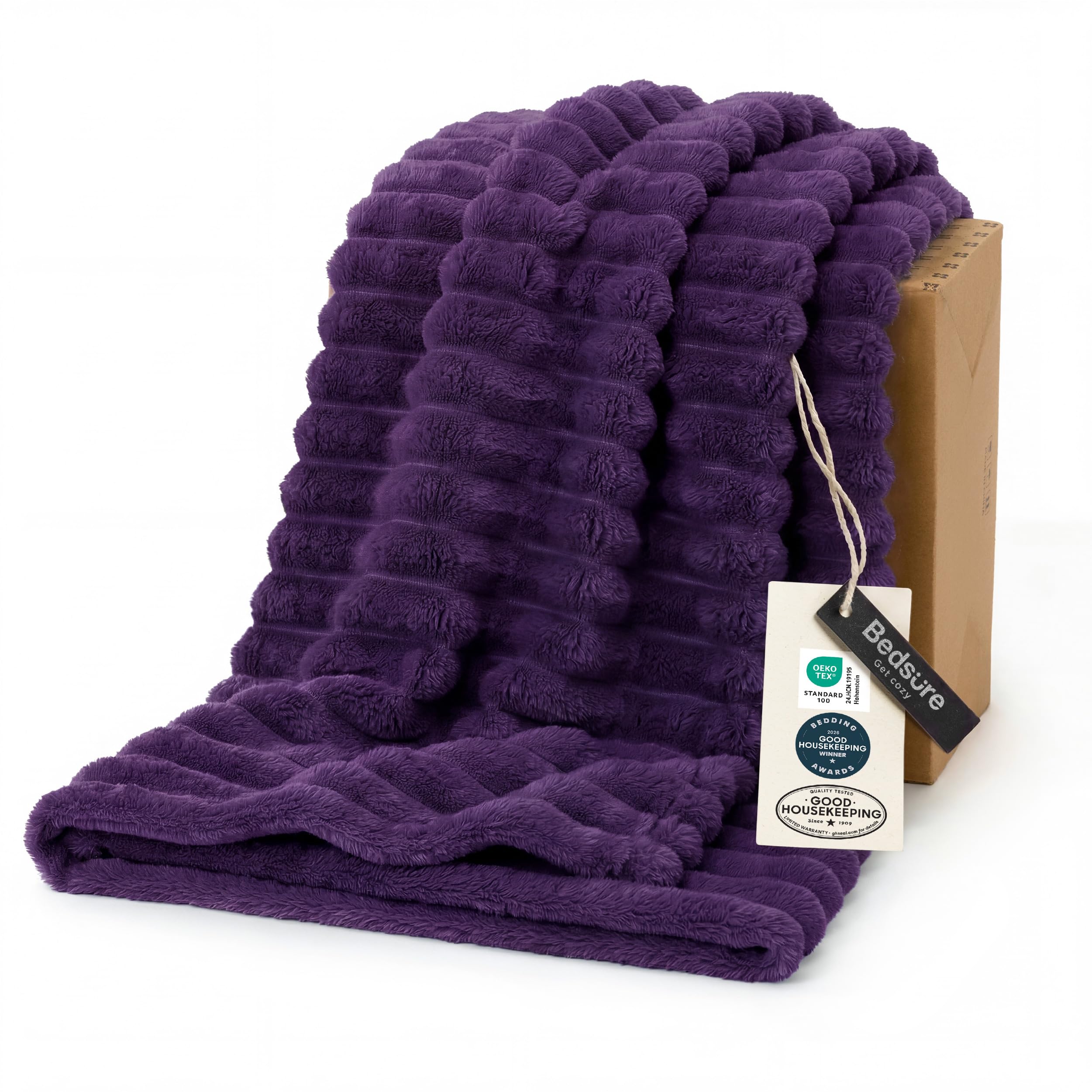 Bedsure GentleSoft purple fleece blanket on couch for cozy lounging