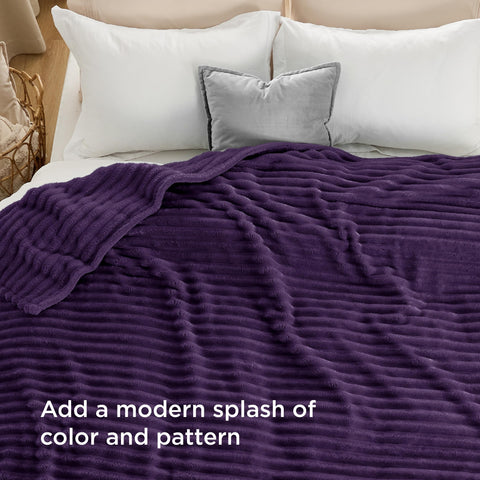 Bedsure blanket close-up shows premium microfiber and plush texture for comforting snuggles