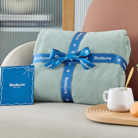 Gift-ready Bedsure GentleSoft sage green blanket in festive packaging