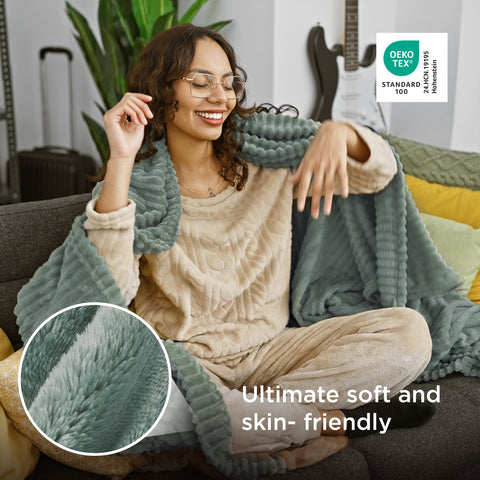 Bedsure GentleSoft sage-green blanket on a bed adds warm, stylish layering
