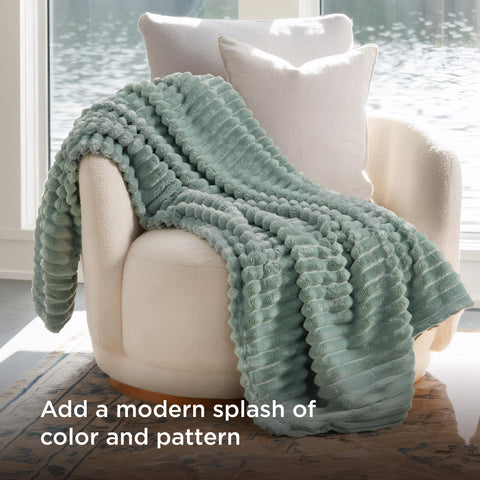 Close-up of Bedsure GentleSoft sage-green fleece with classic stripe texture