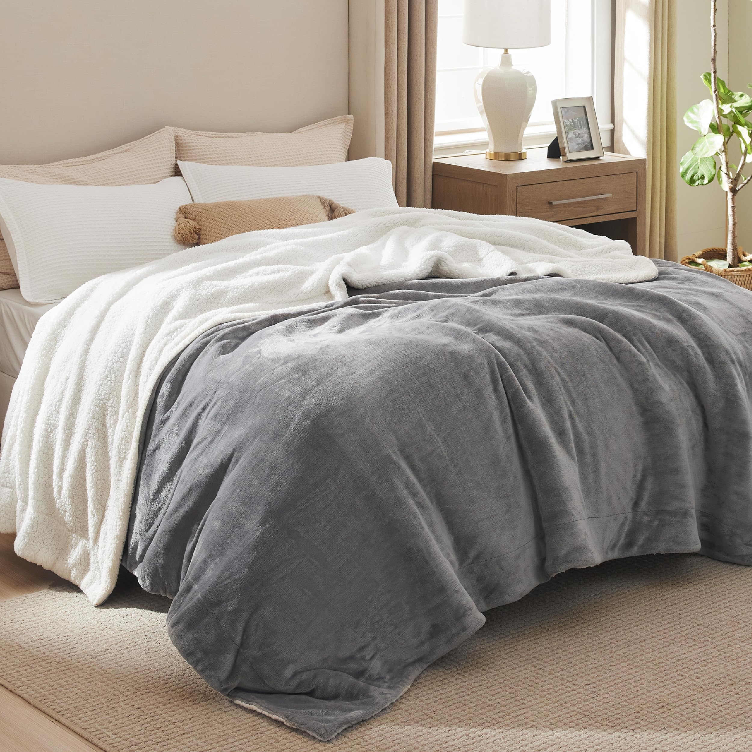 Bedsure GentleSoft Sherpa blanket on bed adds inviting warmth