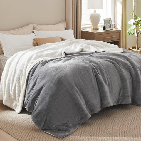 Bedsure GentleSoft Sherpa blanket on bed adds inviting warmth