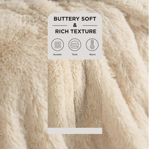 Bedsure GentleSoft two-sided softness on bed shows sherpa and plush sides for versatile comfort
