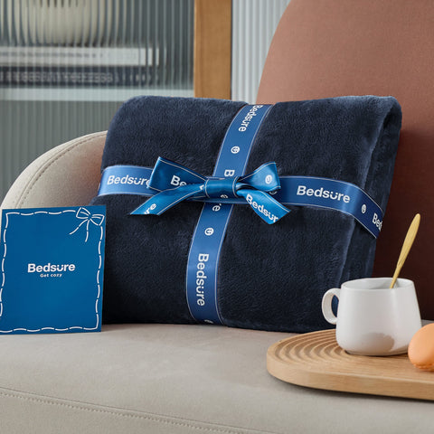 Bedsure GentleSoft throw navy bedside setup for quick warmth