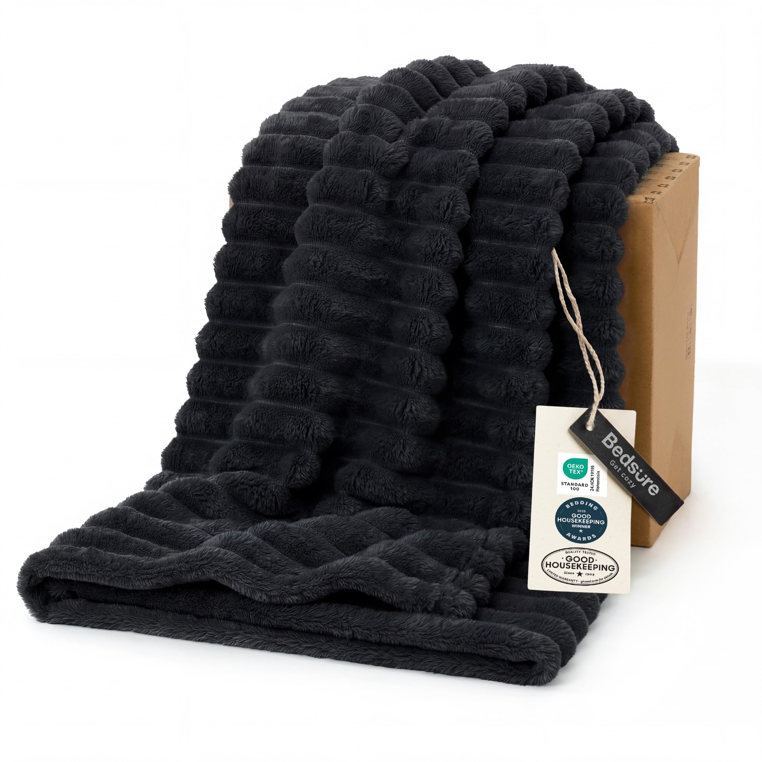 Bedsure GentleSoft Twin XL blanket on the couch with cozy striped fleece texture.