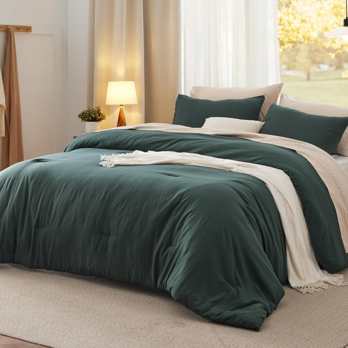 Bedsure king comforter set in forest green on bed for all-season comfort.