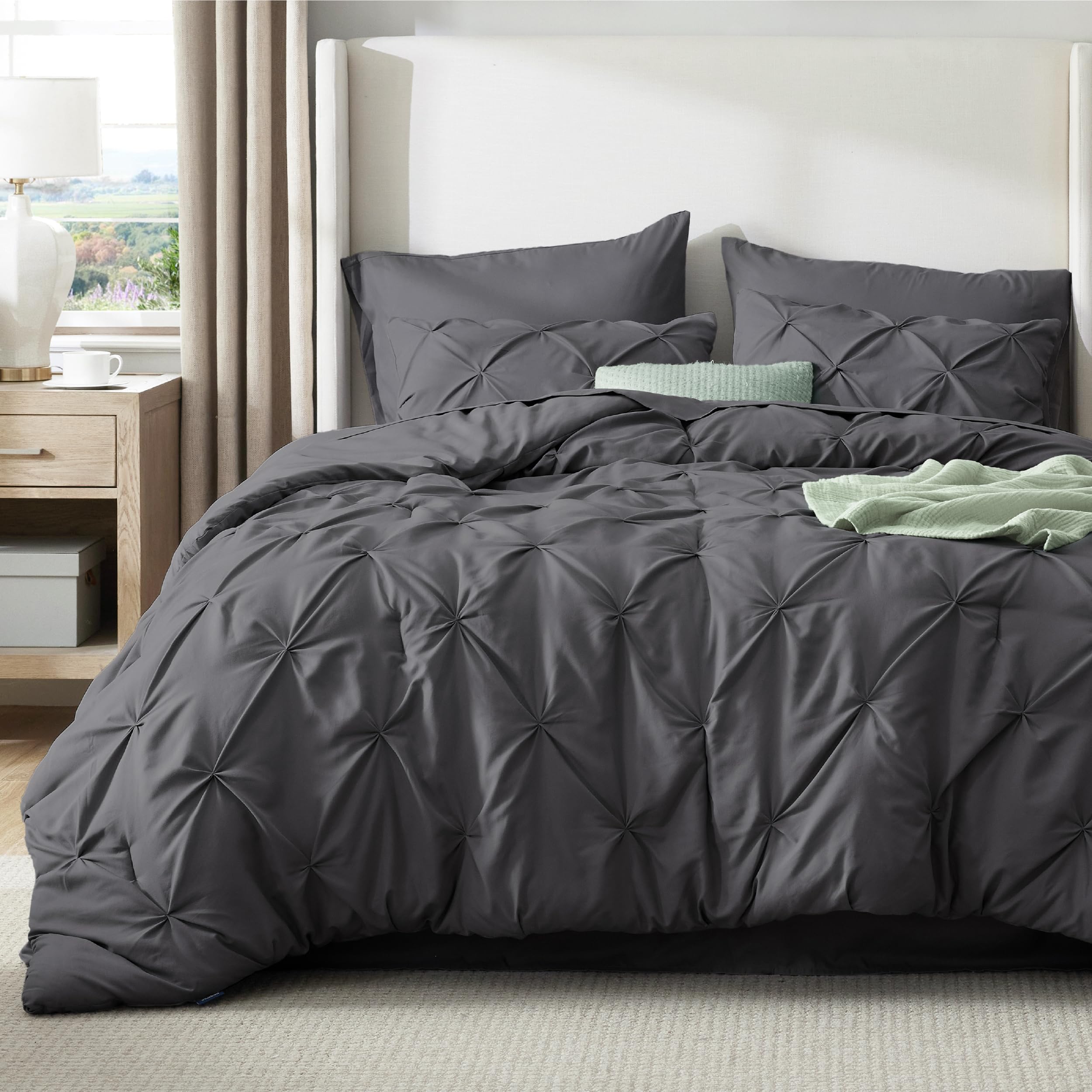 Bedsure king fitted sheet dark grey fits a deep mattress securely.