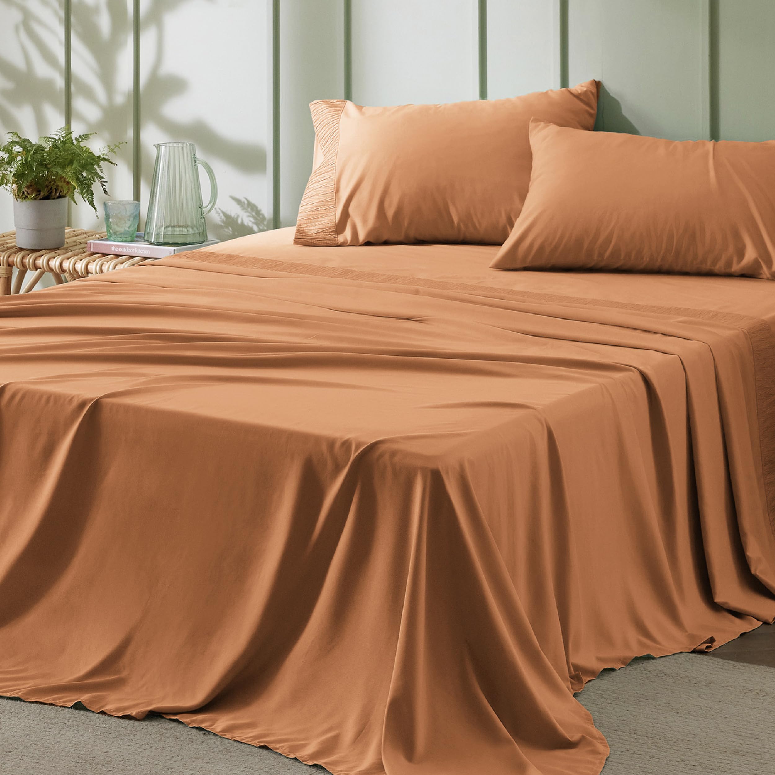 Bedsure king size dusty orange sheets show vibrant color and cozy comfort.