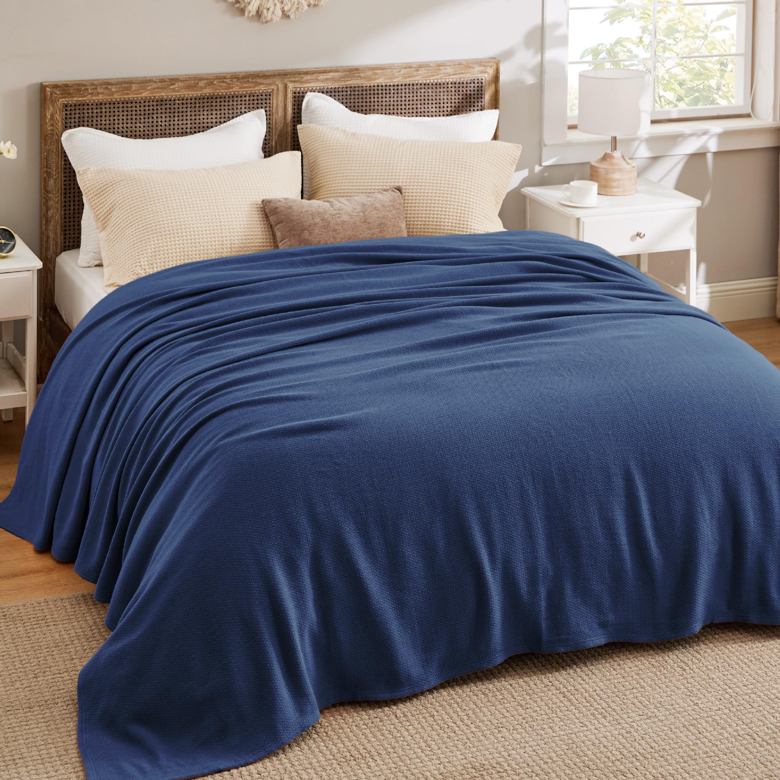 Bedsure king-size blanket draped on a bed for full coverage and cozy warmth.