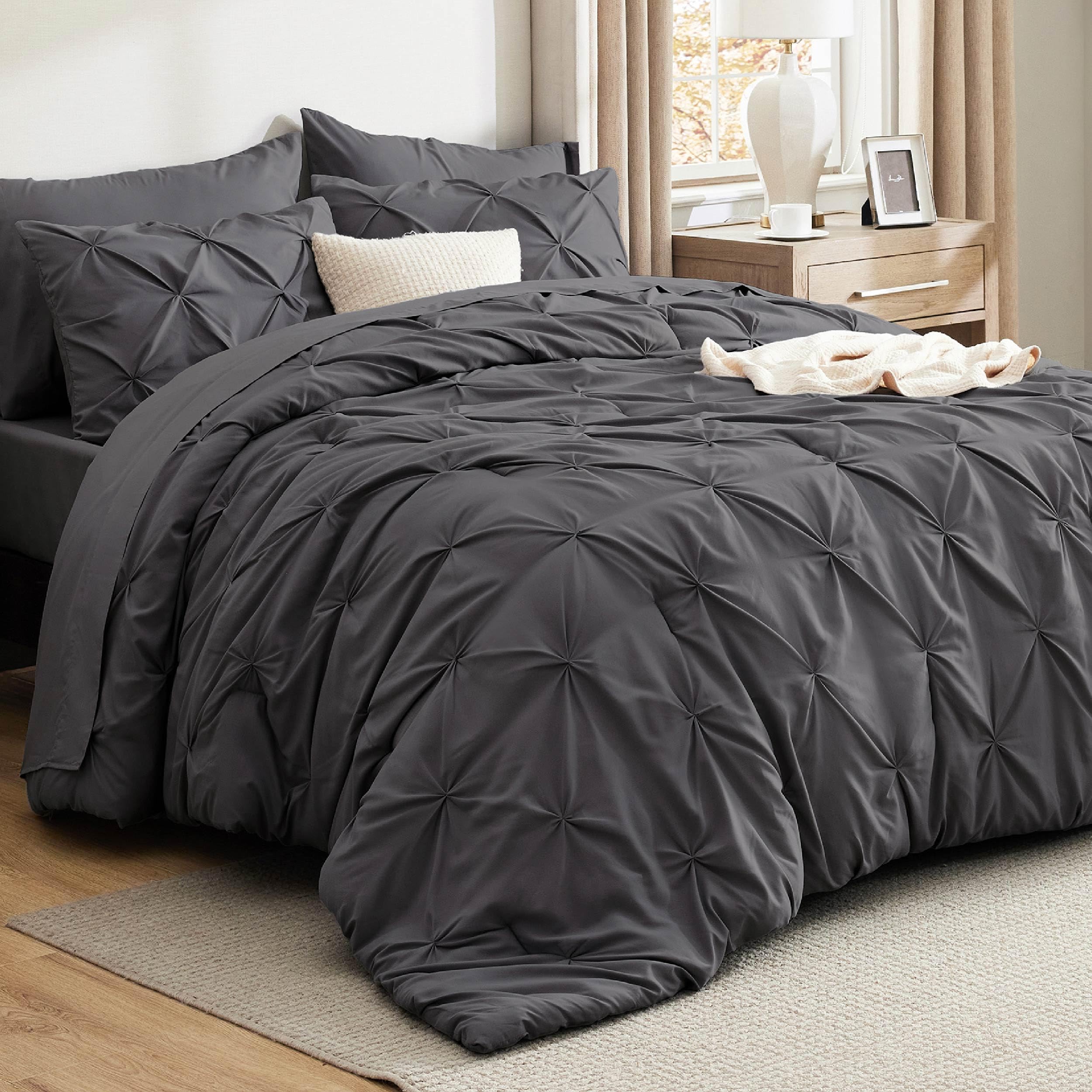 Bedsure king-size comforter dark grey on bed showing cloud-like warmth and softness.
