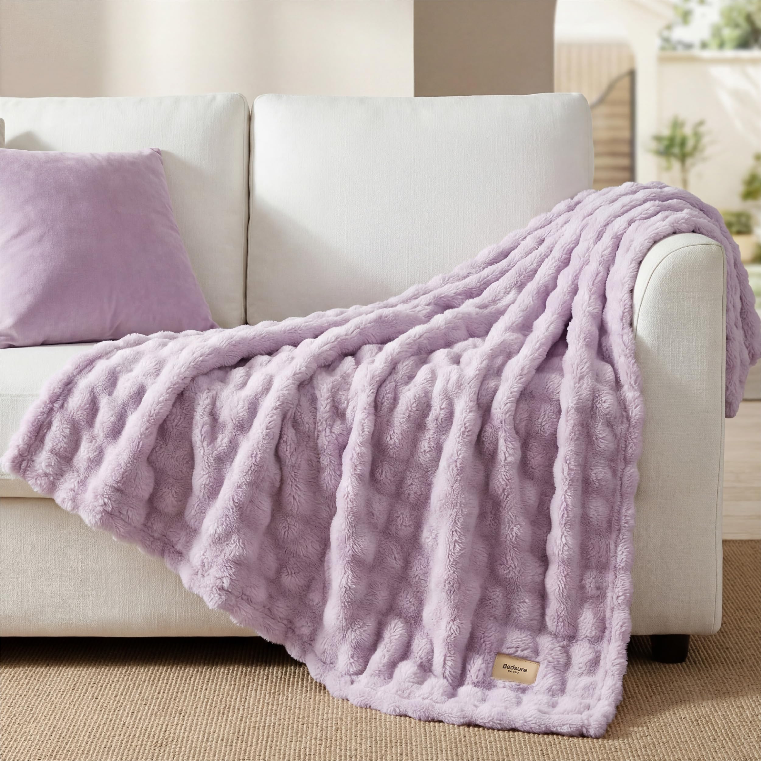 Bedsure lavender decor blanket enhances bedroom styling while offering cozy texture at rest.