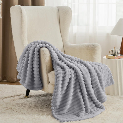 Bedsure light grey fleece blanket warm yet lightweight for easy snuggling