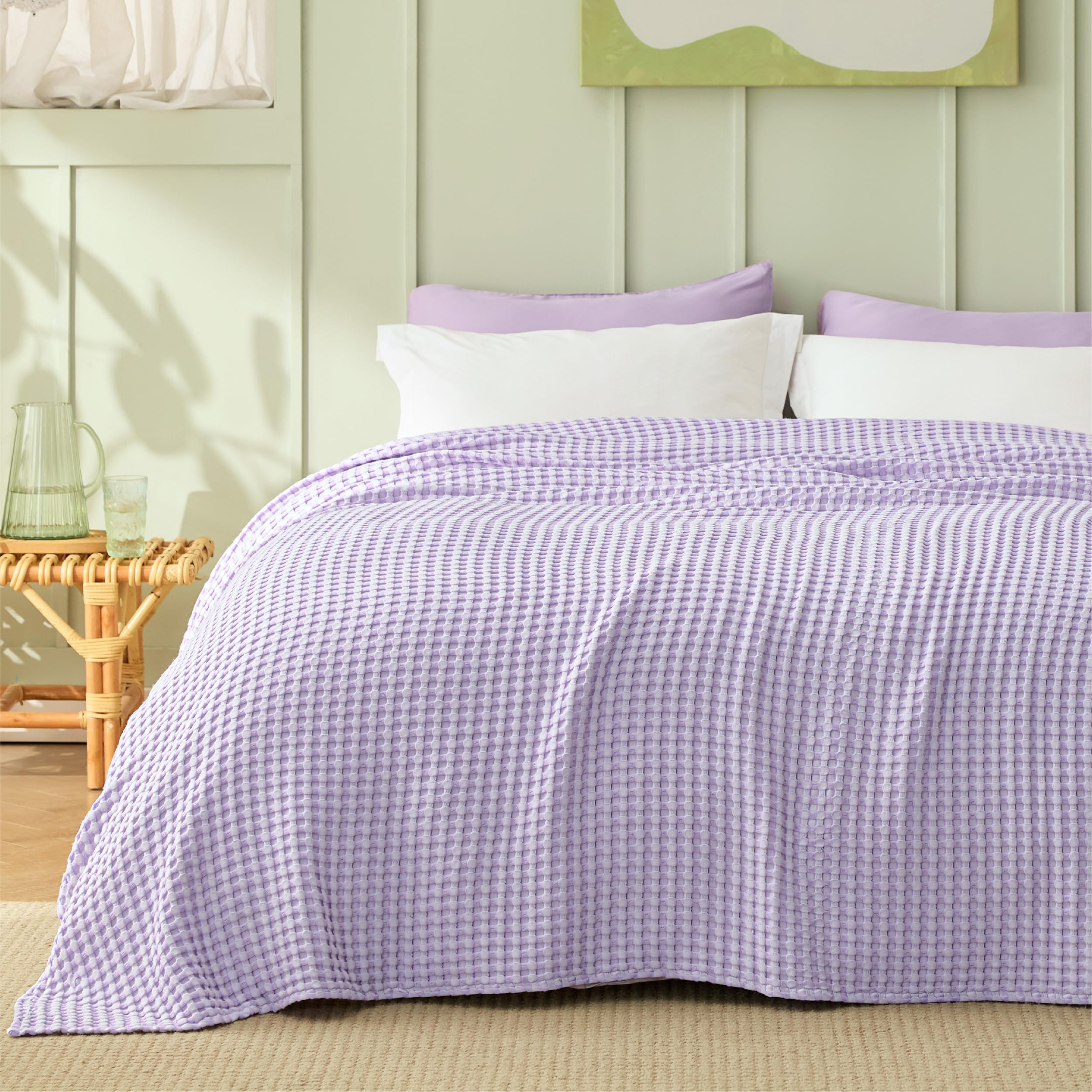Bedsure light purple waffle blanket draped over bed adds a soft color accent