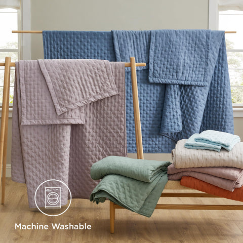 Bedsure King Quilt in living room setup suggests easy-care durability.