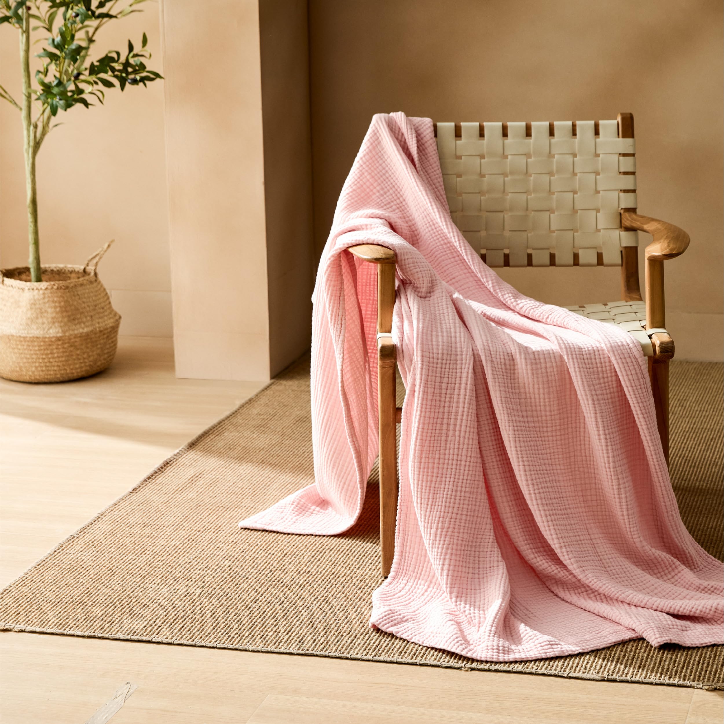 Bedsure pink muslin blanket soft color enhances summer vibe