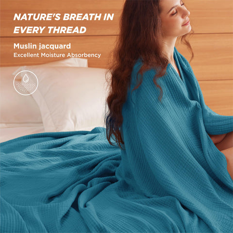 Bedsure muslin blanket teal on bed shows cozy, skin-friendly cotton.