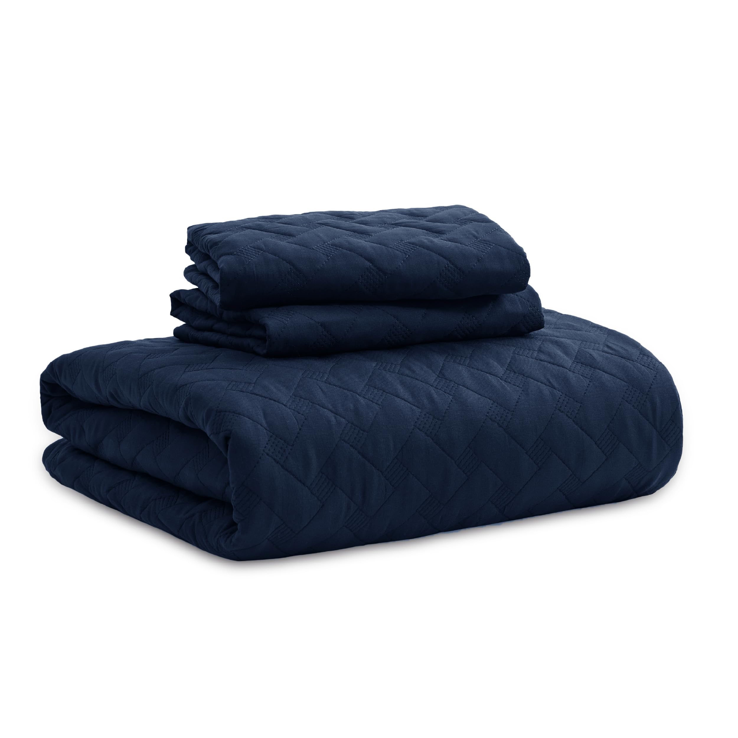 Bedsure navy quilt on bed elevates bedroom decor.