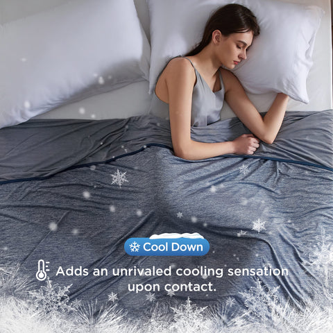 Bedsure navy blue cooling blanket folded for compact storage and travel.