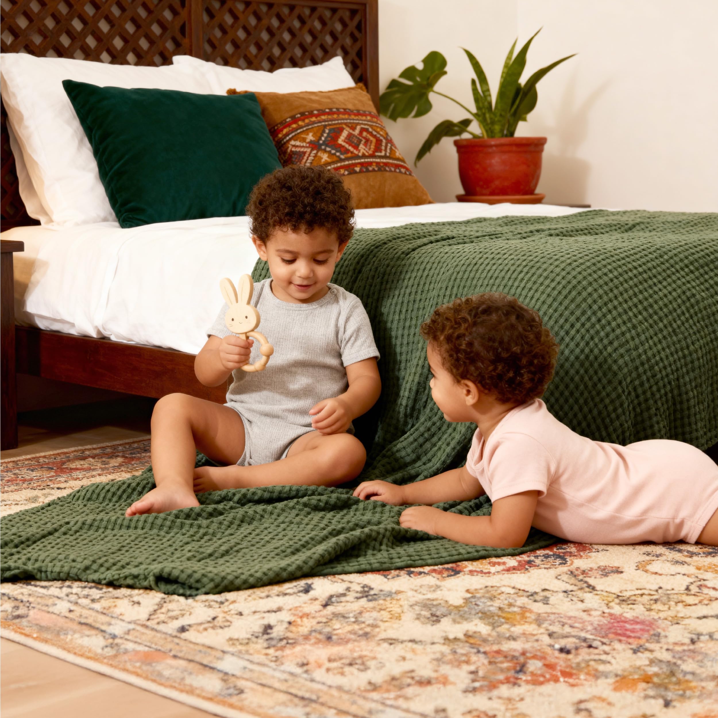 Bedsure olive green blanket shown on bed and couch for home versatility.