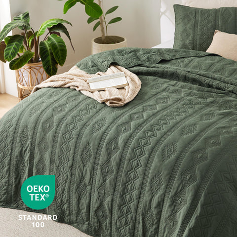 Bedsure olive green quilt with two shams on bed demonstrates cohesive decor