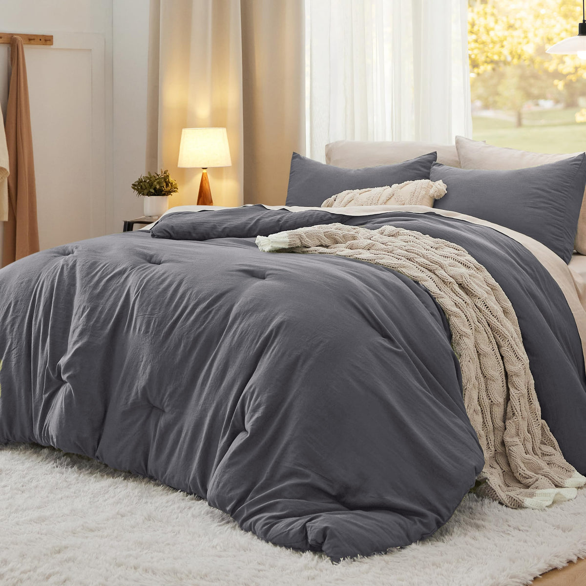 Bedsure oversized king comforter set in dark grey, plush and cozy for cold nights.