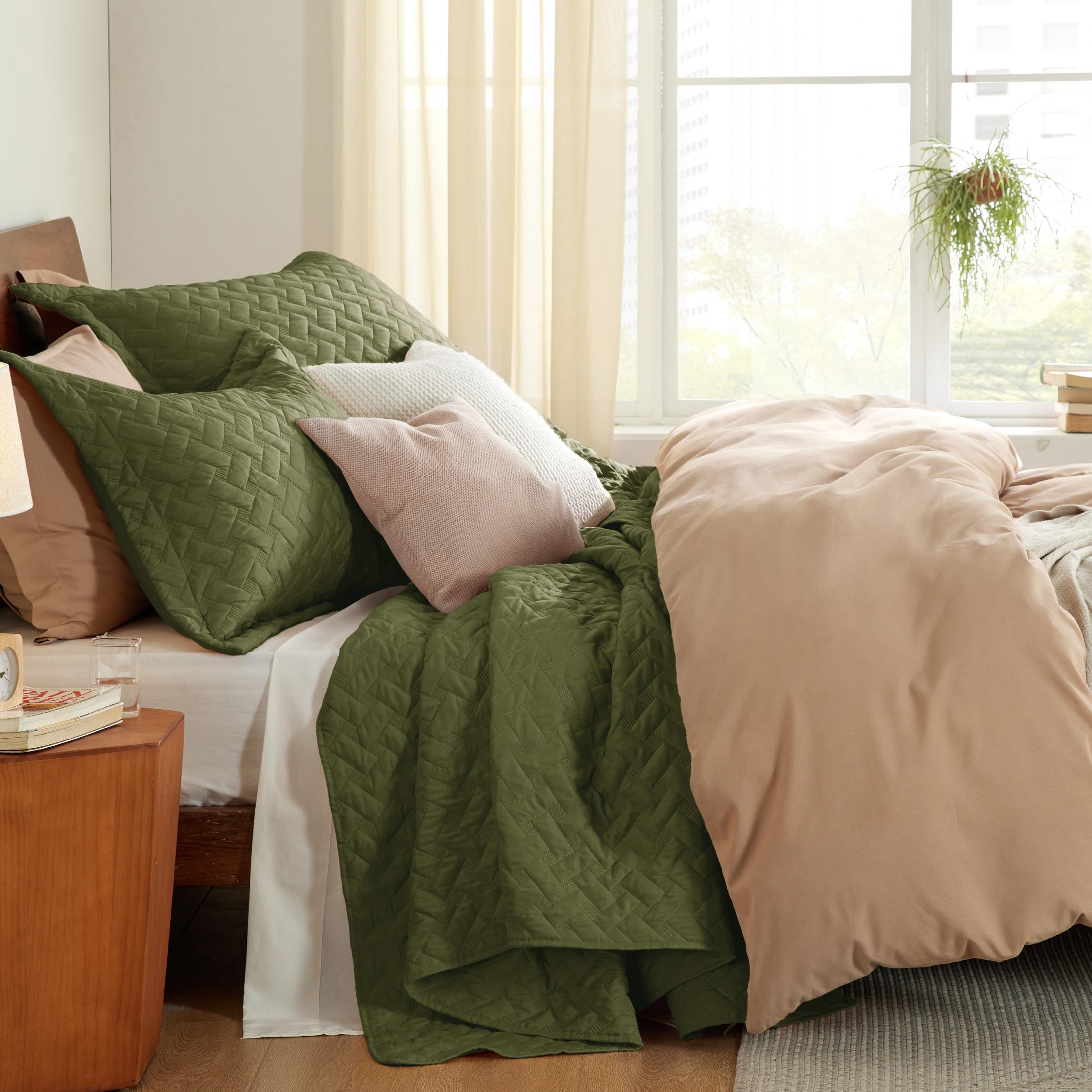 Bedsure pillow shams match the quilt for coordinated bedroom style.