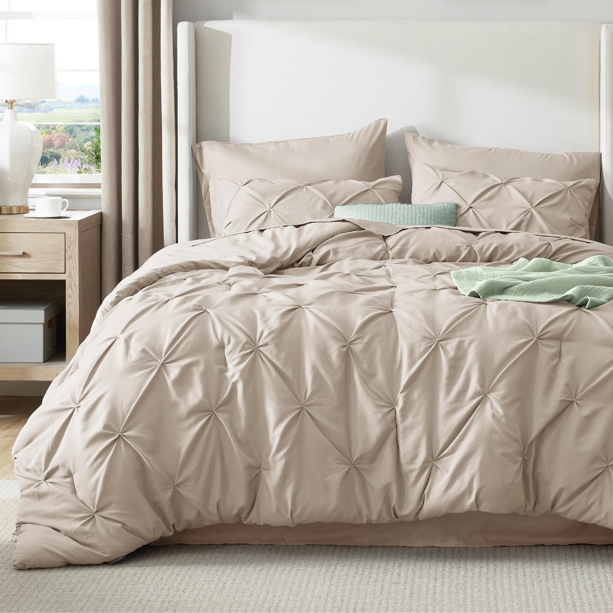 Bedsure pinch-pleat beige pattern adds elegant texture to the bed.