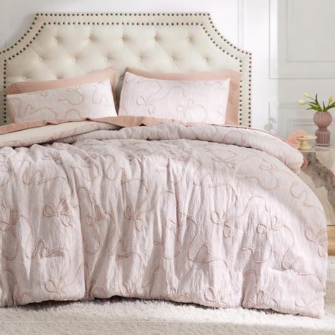 Bedsure pink comforter with butterfly bow pattern adds whimsical style to any bedroom