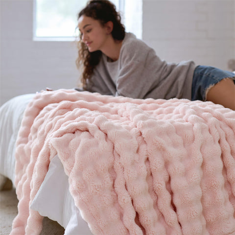 Bedsure fleece blanket styled as bedroom decor for a cute atmosphere.