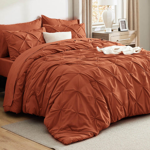 Bedsure queen comforter in burnt orange showcases pintuck detailing for a plush, inviting bed