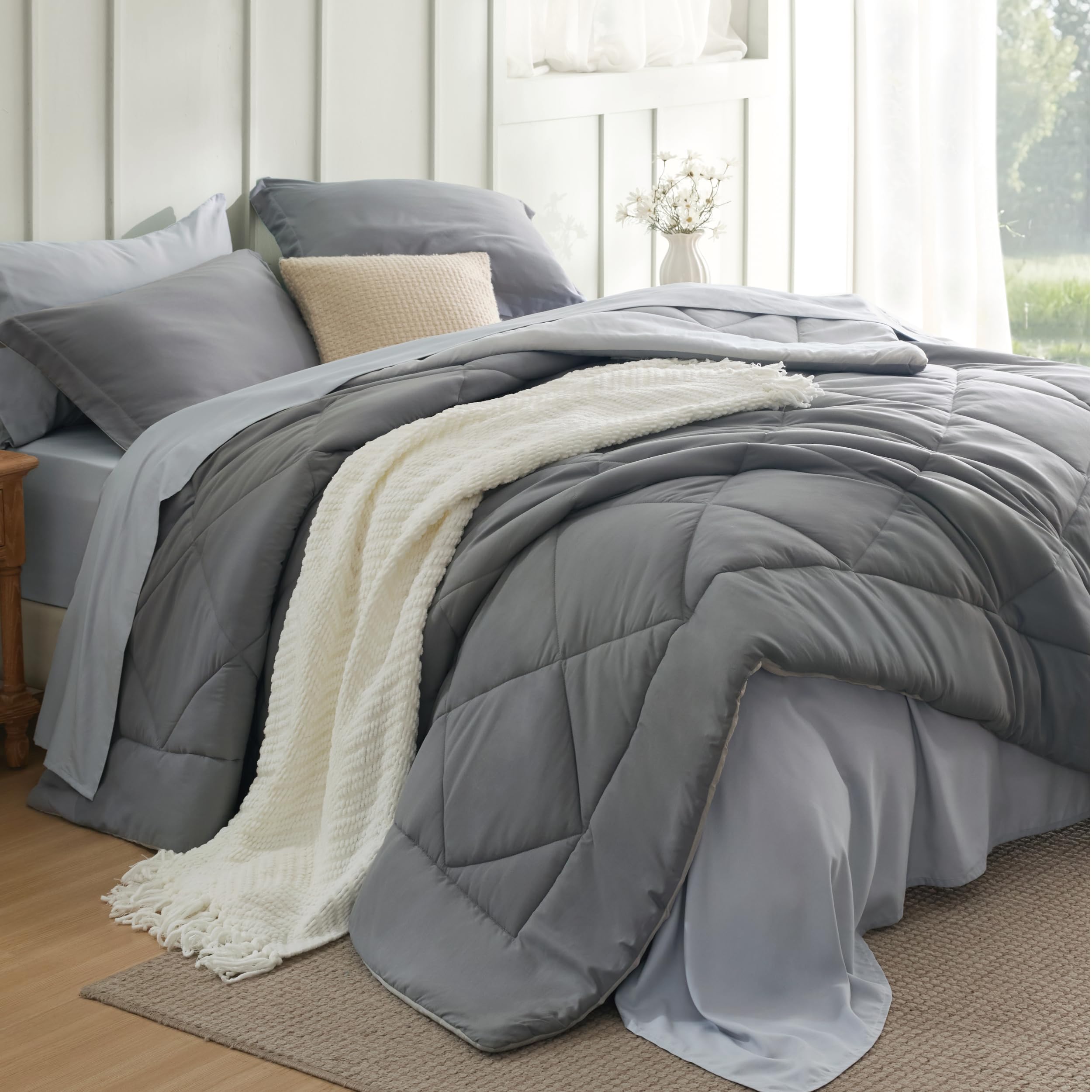 Bedsure queen comforter set 7-piece pack offers plush warmth for all-season coziness.
