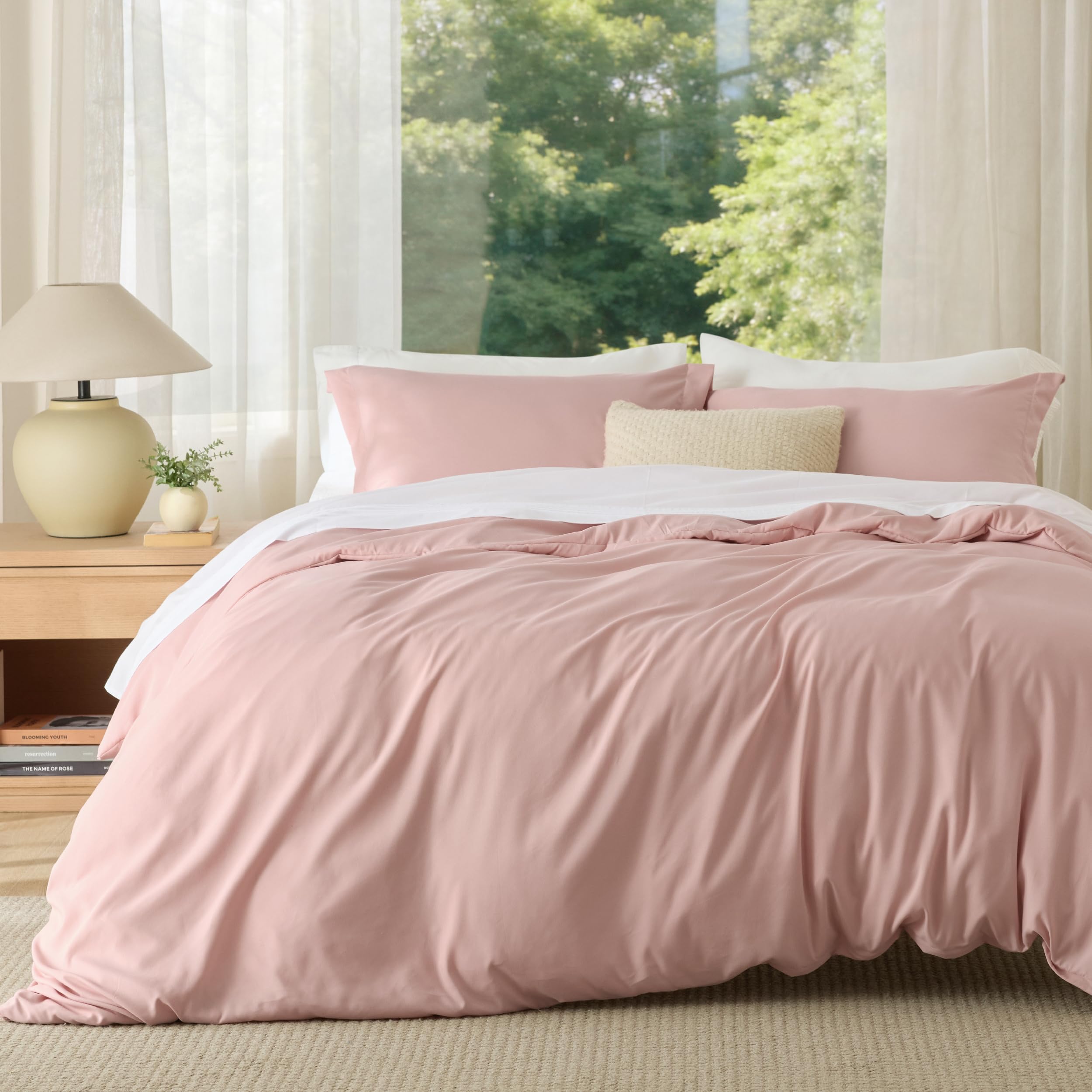 Bedsure queen duvet cover in blush pink features soft, double-brushed fabric for cozy nights.