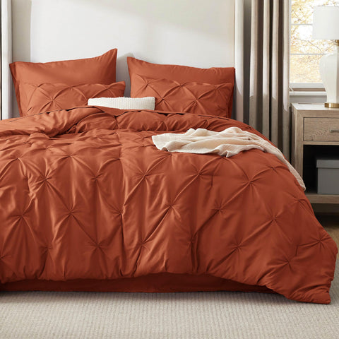 Bedsure queen pillowcases in burnt orange complement the set with smooth softness
