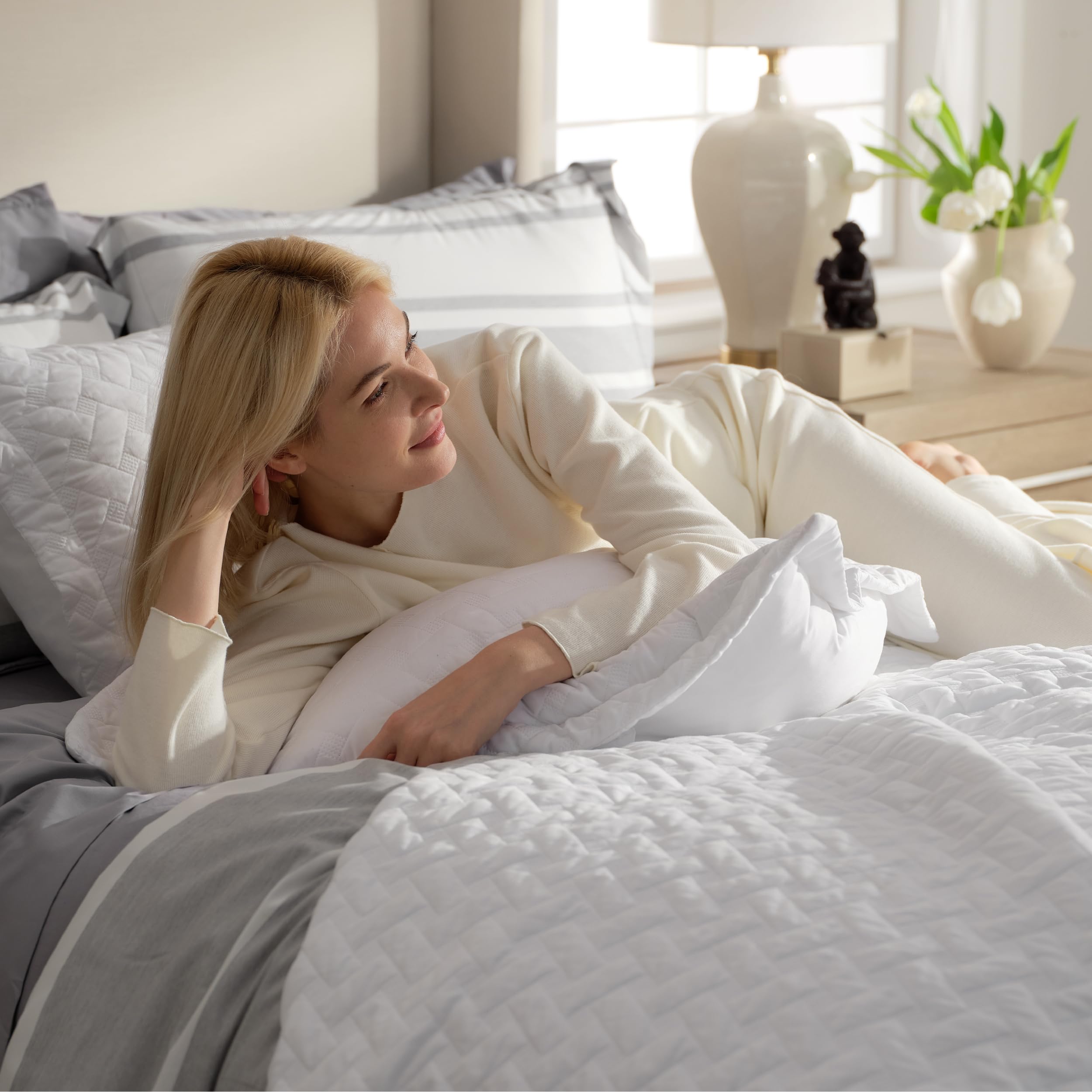 Bedsure queen quilt soft microfiber filling demonstrates lightweight, breathable year-round comfort.